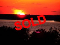 CONDO FOR SALE....With the Best view of Grand Lakes Sunsets. The best Golfing & Boating on the Planet!